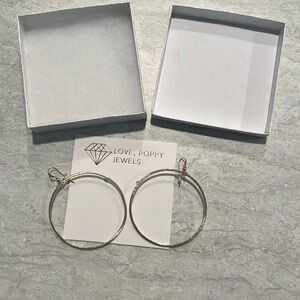 New in box Love Poppy earrings